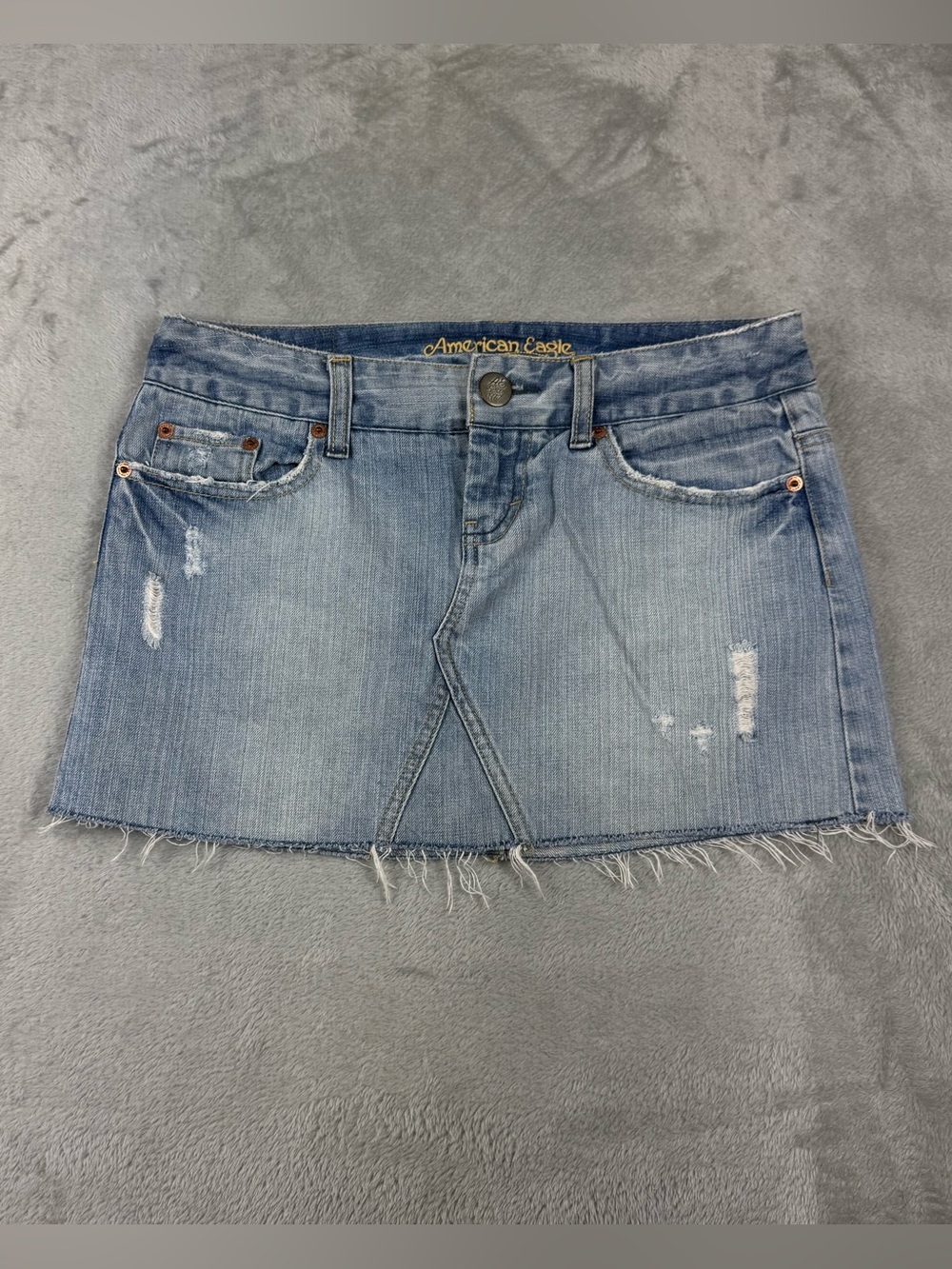 American Eagle denim mini skirt sz 2 light wash distressed frayed hem